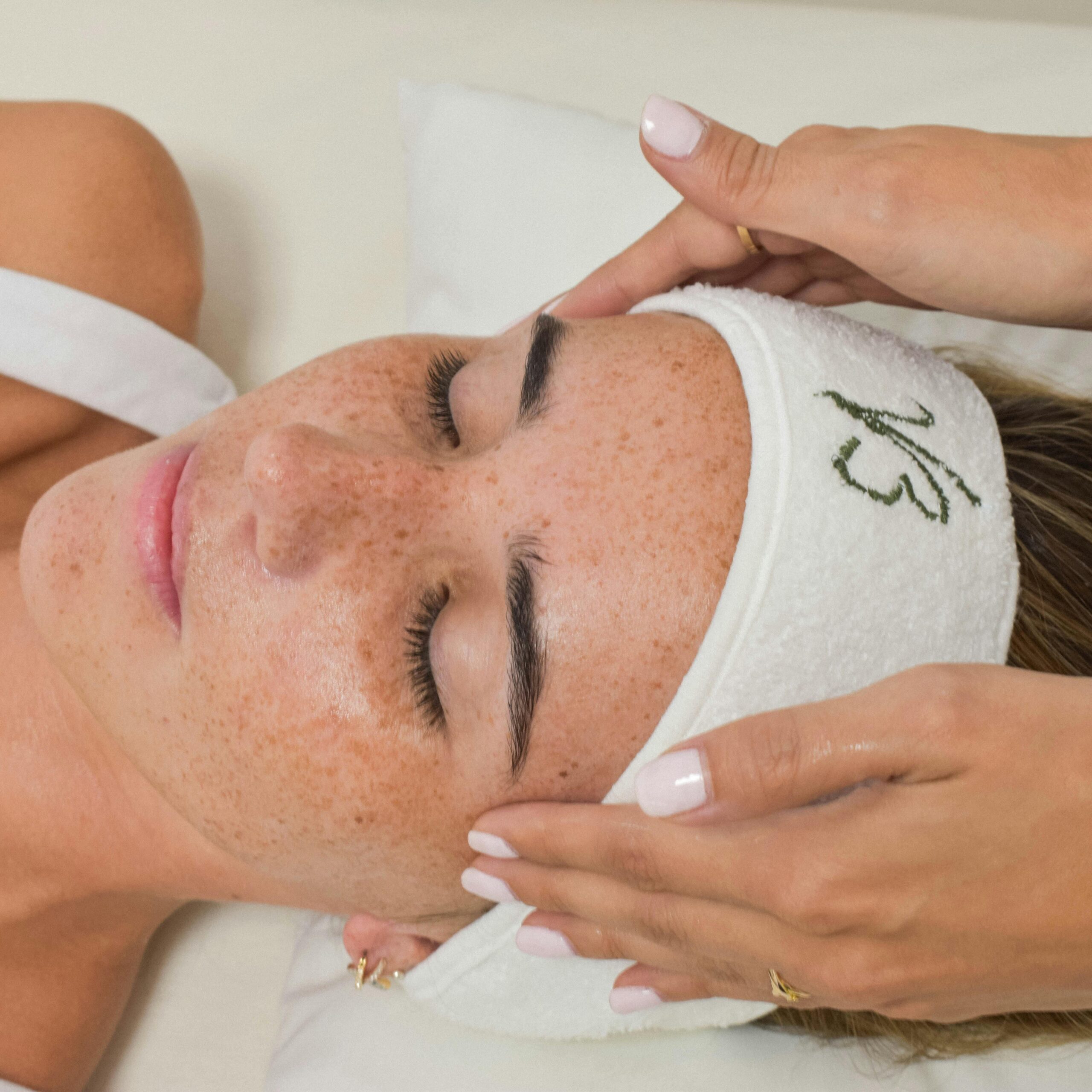 Enjoy a rejuvenating facial massage session in a serene beauty salon setting.